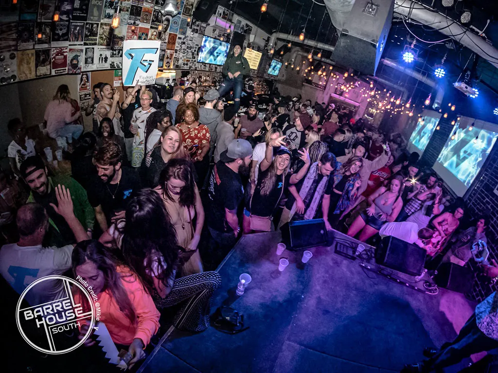 Packed crowd enjoying live music at Barrelhouse South in Savannah