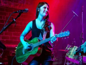 CC Witt performing live with guitar at Barrelhouse South in Savannah GA