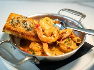 Shrimp and toast dish at Myrtle and Rose rooftop bar Savannah GA