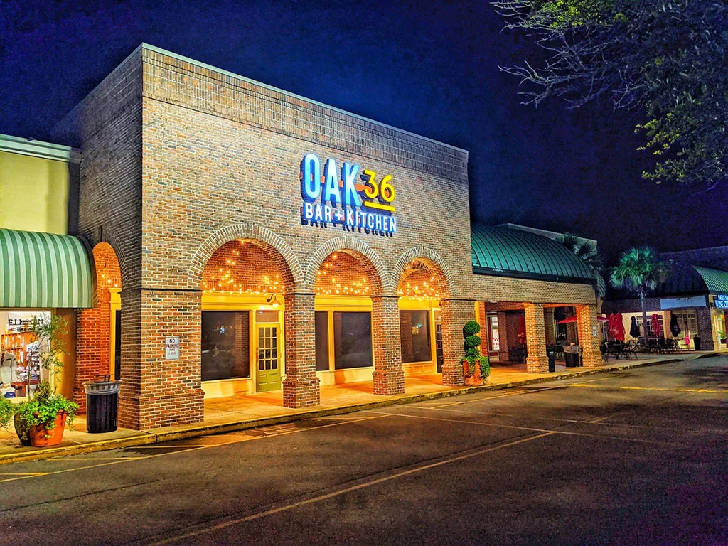 Oak 36 Bar + Kitchen exterior at night in Savannah GA
